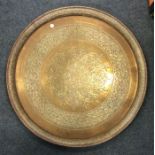 A large Eastern brass charger. Approx. 49 cms in d