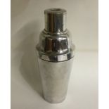 A silver plated cocktail shaker. Est. £10 - £20.