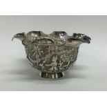 An Indian silver sugar bowl decorated with figures