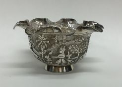 An Indian silver sugar bowl decorated with figures