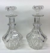 A pair of Antique glass decanters of shaped forms