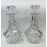 A pair of Antique glass decanters of shaped forms