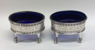 A pair of large George III silver salts with openw