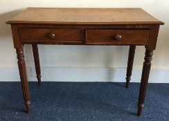 A Victorian mahogany two drawer desk. Est. £20 - £