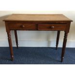 A Victorian mahogany two drawer desk. Est. £20 - £