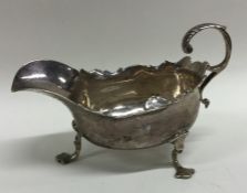 A small Georgian silver sauce boat with card cut r