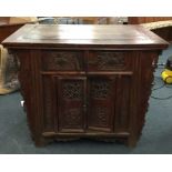 A Continental two door sideboard with tapering sid