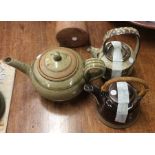 Three various stoneware pottery teapots of various