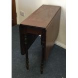 A Victorian mahogany drop leaf table. Est. £30 - £