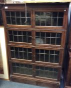 A pair of Globe Wernicke style corner bookcases wi