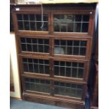 A pair of Globe Wernicke style corner bookcases wi