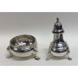 A good Edwardian silver two piece cruet set on cab