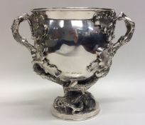 A fine quality George III chased silver two handle