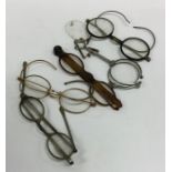 A bag containing numerous vintage spectacles. Est.