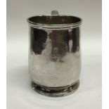 A good quality crested George II silver mug on spr