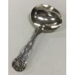 A heavy Kings' pattern silver caddy spoon. London.
