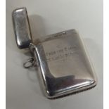 A large heavy silver vesta case with hinged top. B