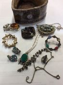 A collection of silver and other jewellery contain