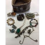 A collection of silver and other jewellery contain