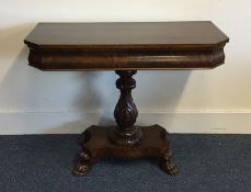 A Victorian mahogany single pedestal tea table on