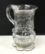 A decorative glass with moulded handle. Est. £60 -