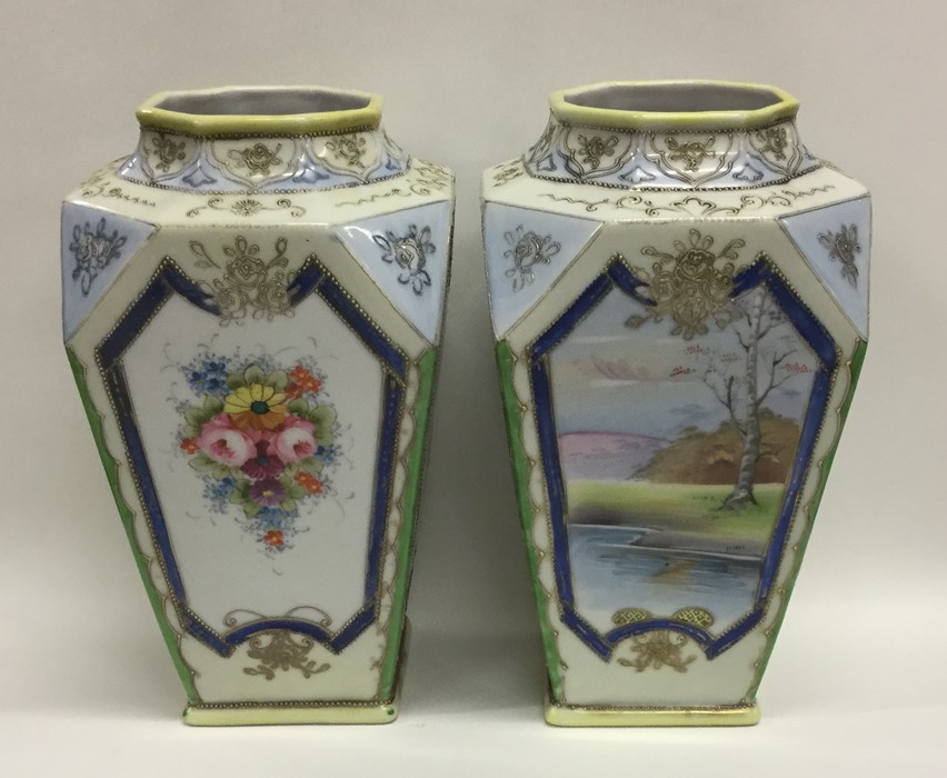 A pair of Chinese vases of tapering forms. Approx.