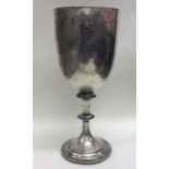 A large heavy plain Victorian silver goblet with e