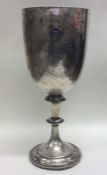 A large heavy plain Victorian silver goblet with e