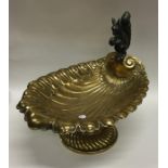 An attractive brass pedestal dish mounted with a s