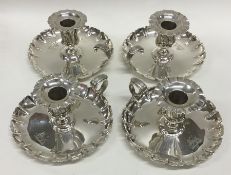 A good rare set of four circular silver chamber st