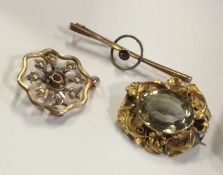A small gold brooch together with a pendant etc. A