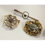 A small gold brooch together with a pendant etc. A