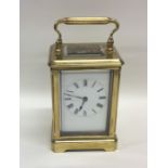 A rectangular brass mounted carriage clock with wh