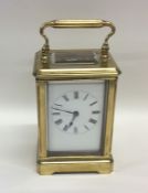 A rectangular brass mounted carriage clock with wh