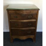 A 20th Century mahogany bow front chest with three