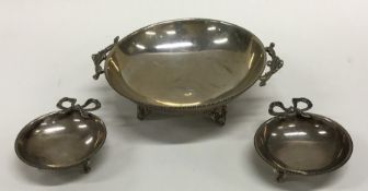 A circular Continental silver pin dish together wi