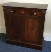 A reproduction two door side cabinet with shell in