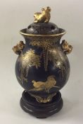 An Eastern baluster shaped pot pourri and cover de