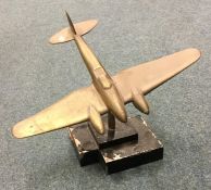 A heavy brass model of a World War II Military aer