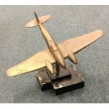 A heavy brass model of a World War II Military aer