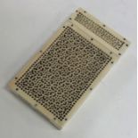 An unusual carved ivory card case with pierced dec
