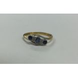 A sapphire and diamond five stone ring in 18 carat