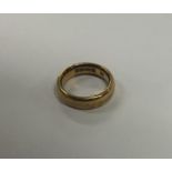 A plain 22 carat gold wedding band. Approx. 8.8 gr