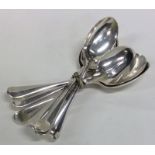 A set of eight silver rat tail large teaspoons. Lo