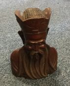 A Chinese hardwood carving of a Buddha. Approx. 19
