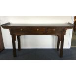 A large Continental altar table with three drawers
