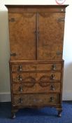 An Edwardian mahogany cocktail cabinet with four d