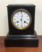 An Edwardian mantle clock with white enamelled dia
