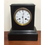 An Edwardian mantle clock with white enamelled dia