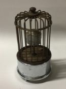 An unusual birdcage clock of typical form on chrom